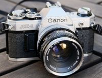 Canon AE-1 and
                Canon EF, history