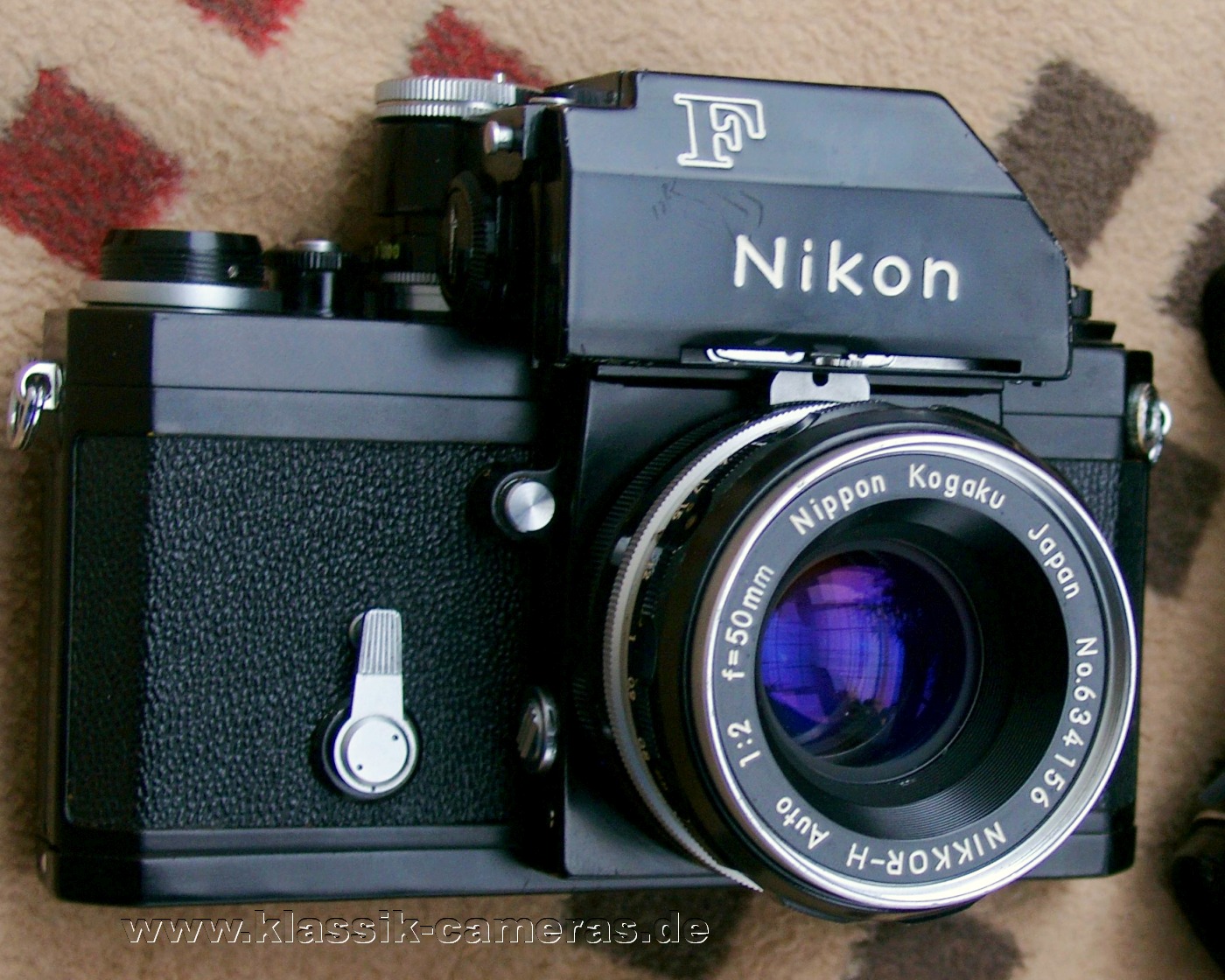 Nikon FTn,
        Nikkor-H Auto 1:2 f=50mm